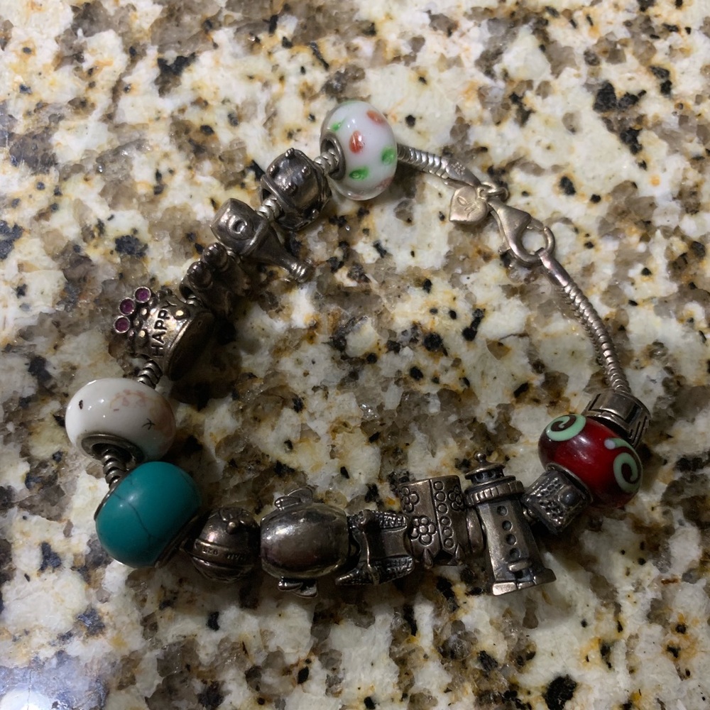Sterling silver charm bracelet. Pandora, Chamilia